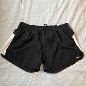 Women’s XL Reebok running shorts.